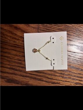 Kendra Scott Gold Dangle Earrings with Pink Gem